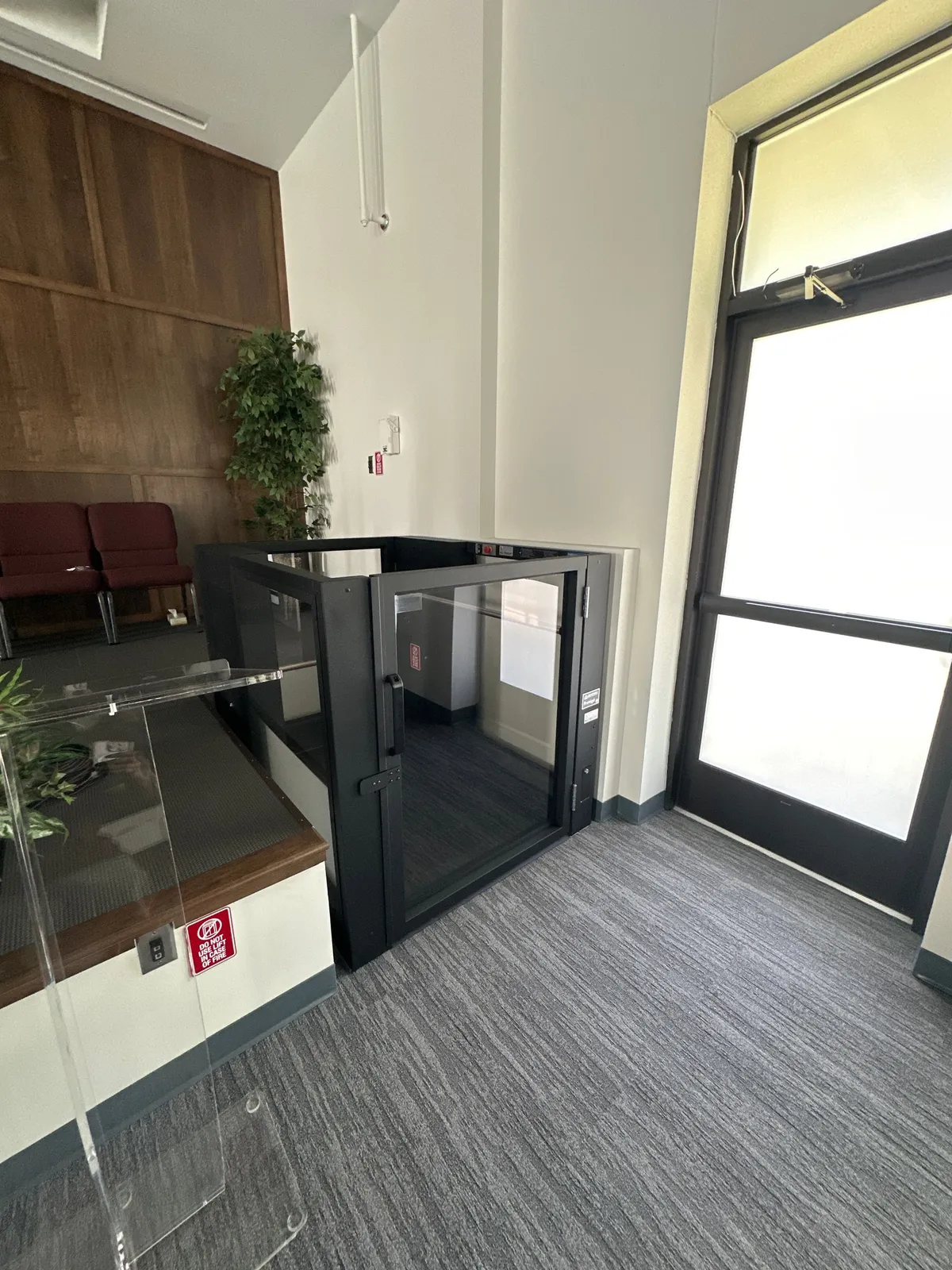 Commercial enclosed vertical platform lift installed in a Harrisburg, PA building
