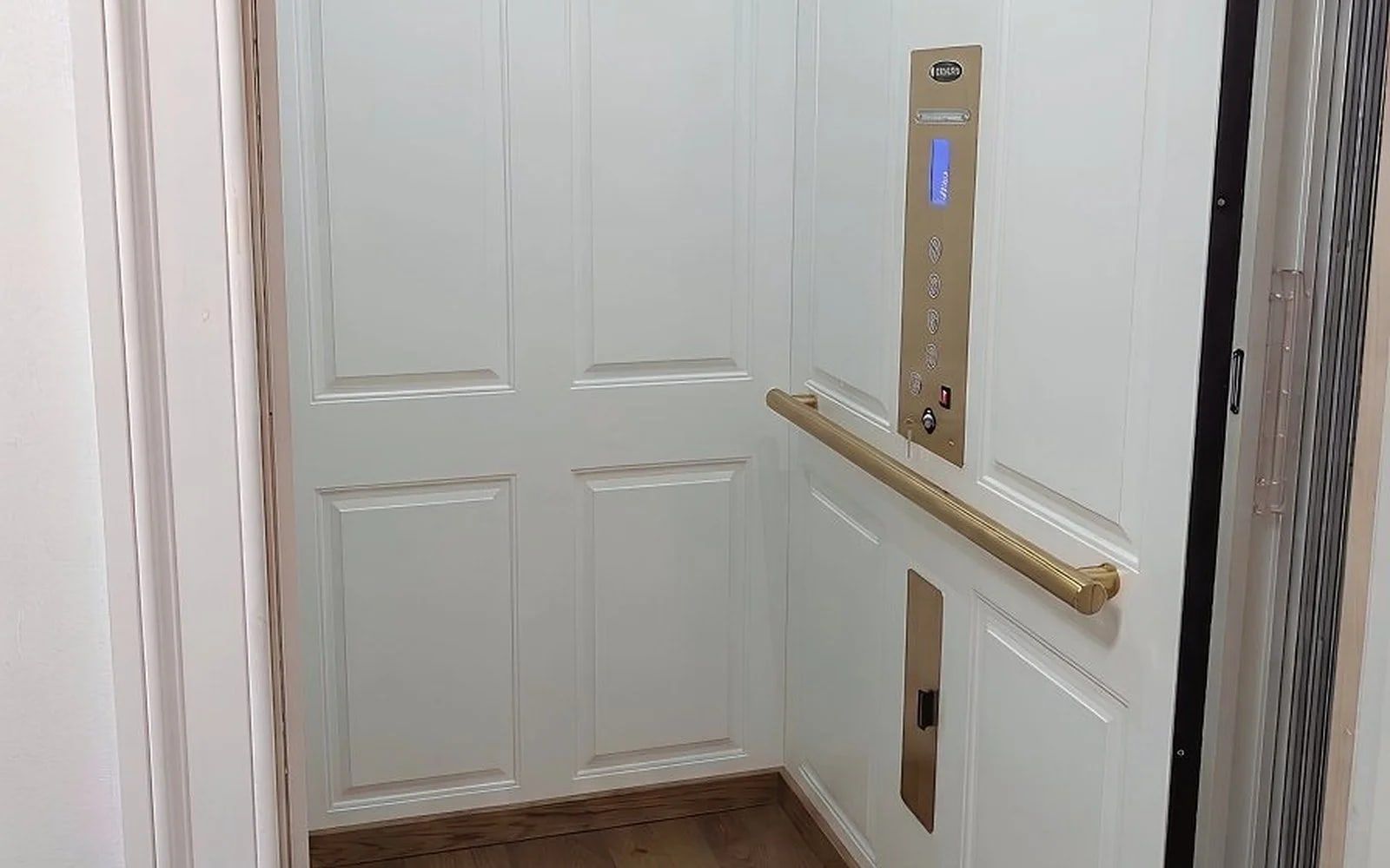 Savaria Eclipse home elevator with white paneled cab in Ambler, PA