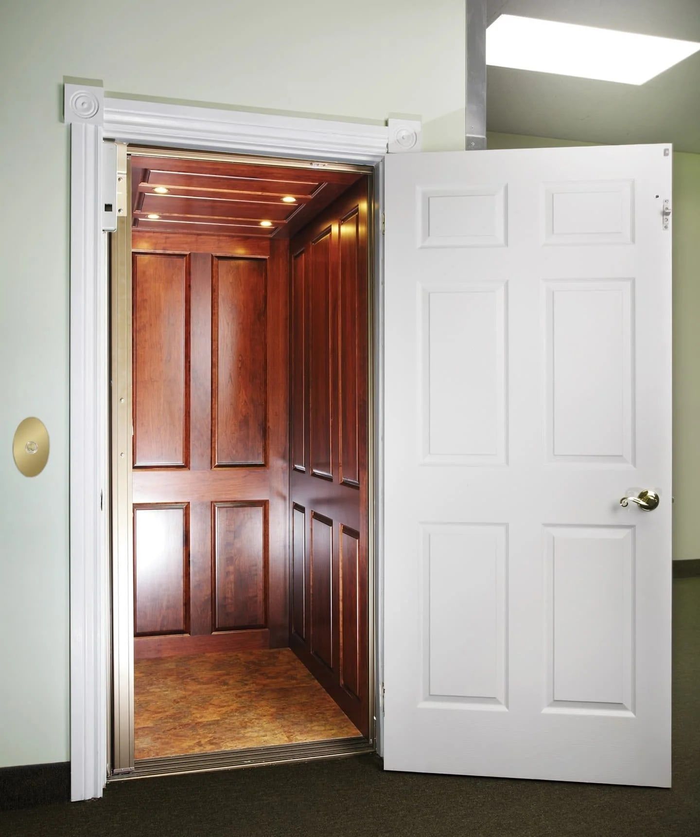 Savaria Eclipse elevator landing with flush door