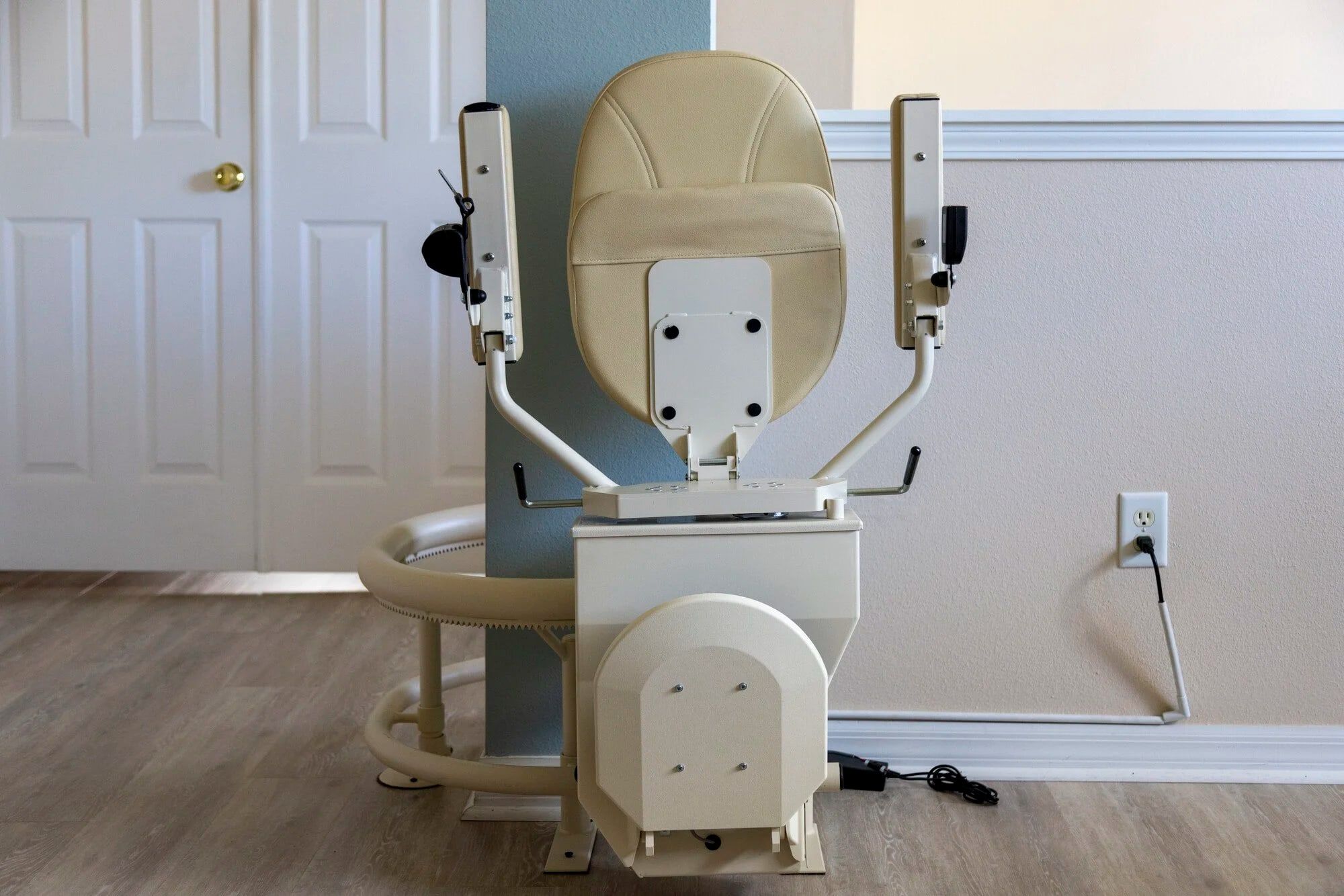Harmar Helix curved stairlift seat on a staircase