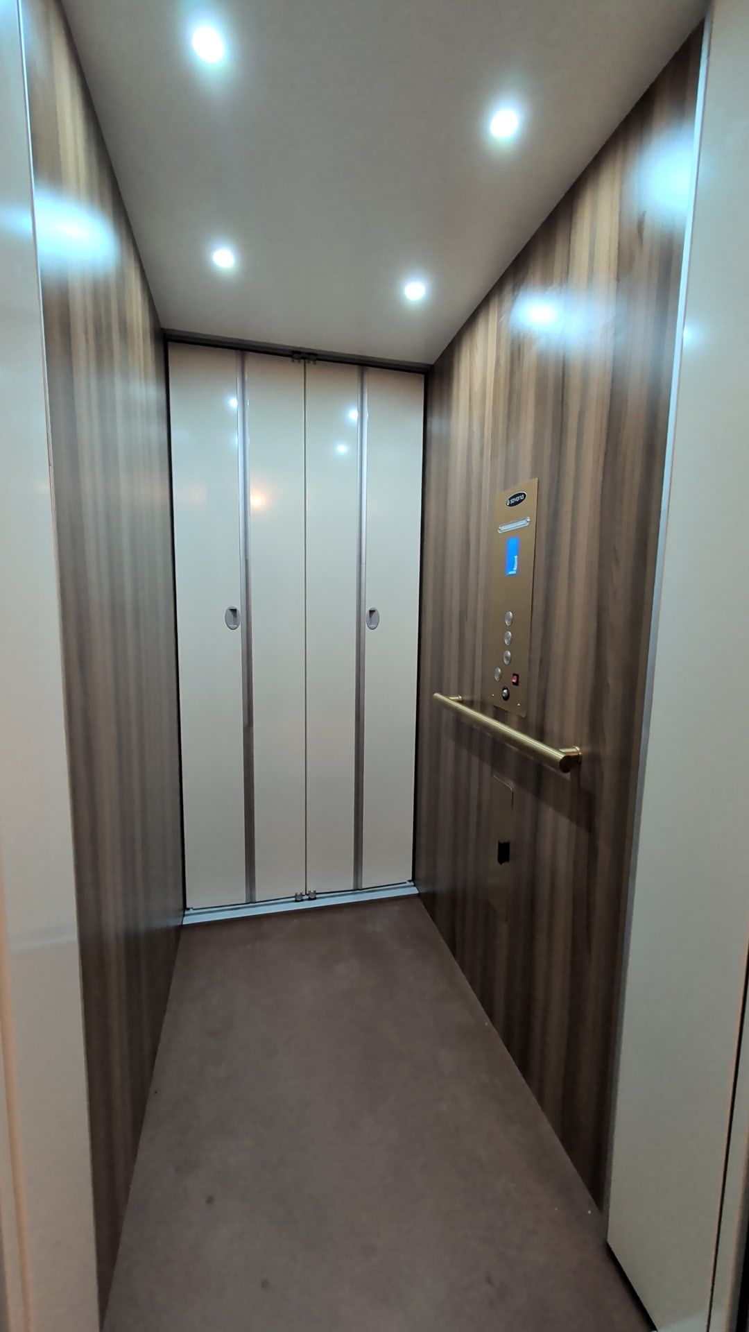 Savaria elevator cab with wood-look walls in Lancaster, PA
