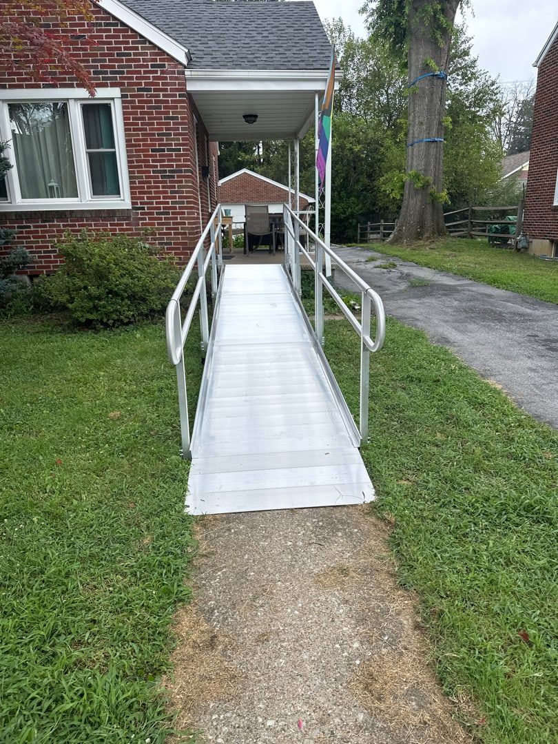 Modular aluminum ramp with switchback leading to a brick home in Temple, PA