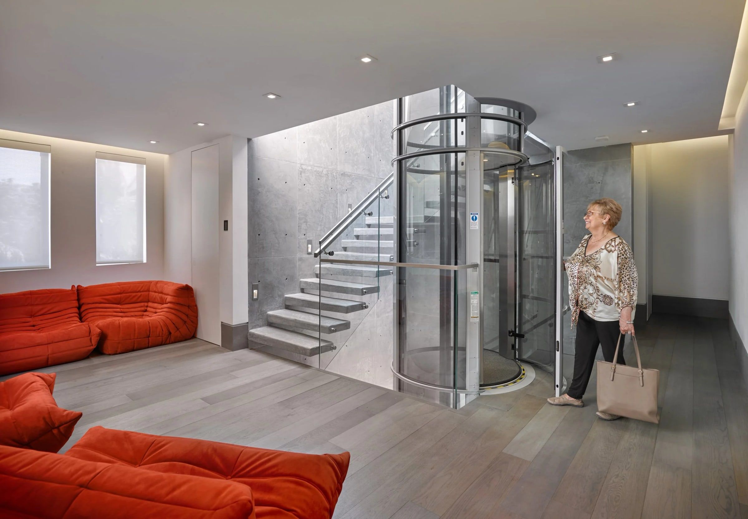 PVE30 pneumatic elevator rising through a stairwell