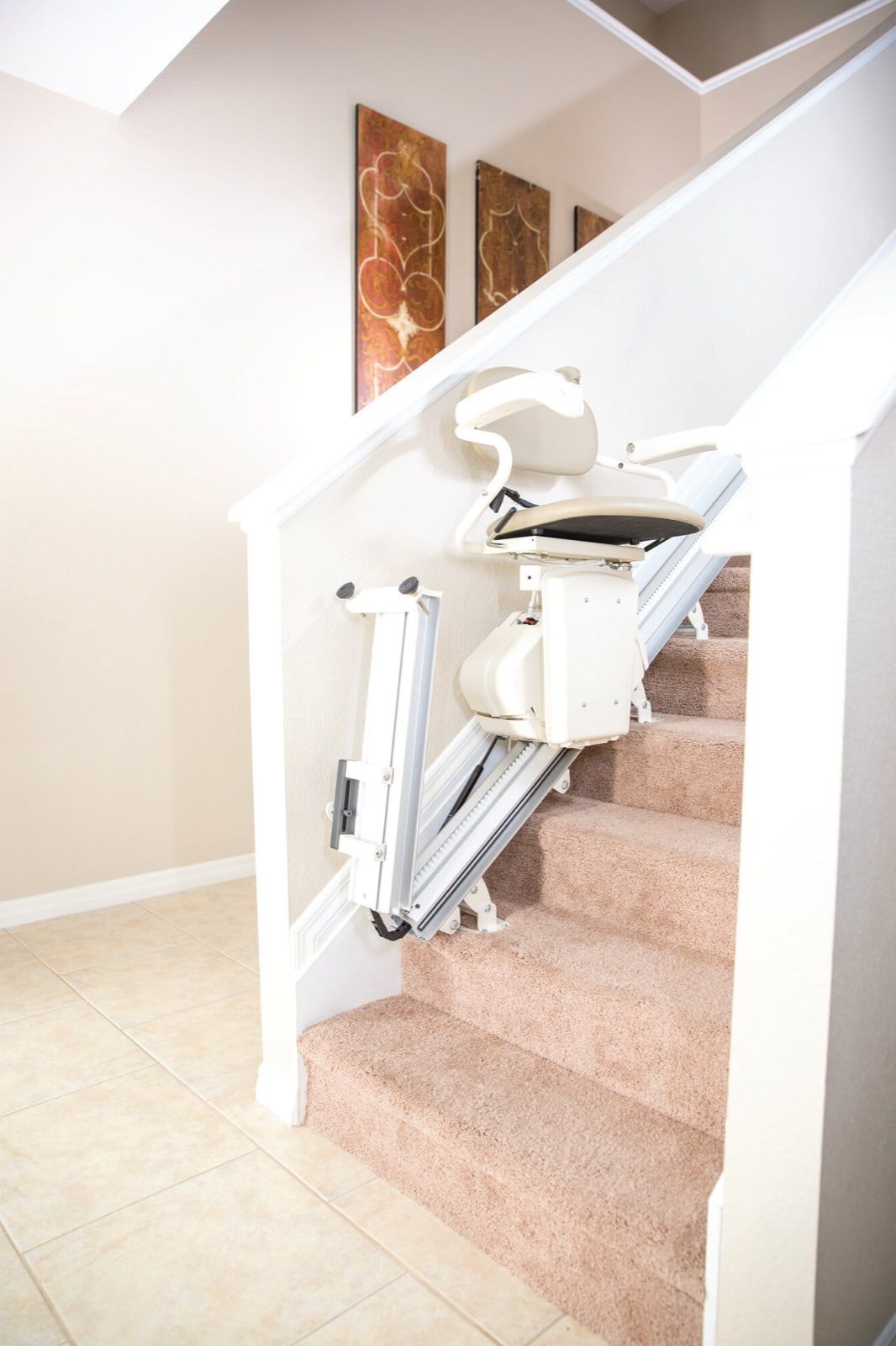 Harmar Pinnacle SL300 installed on a carpeted staircase with the folding rail raised