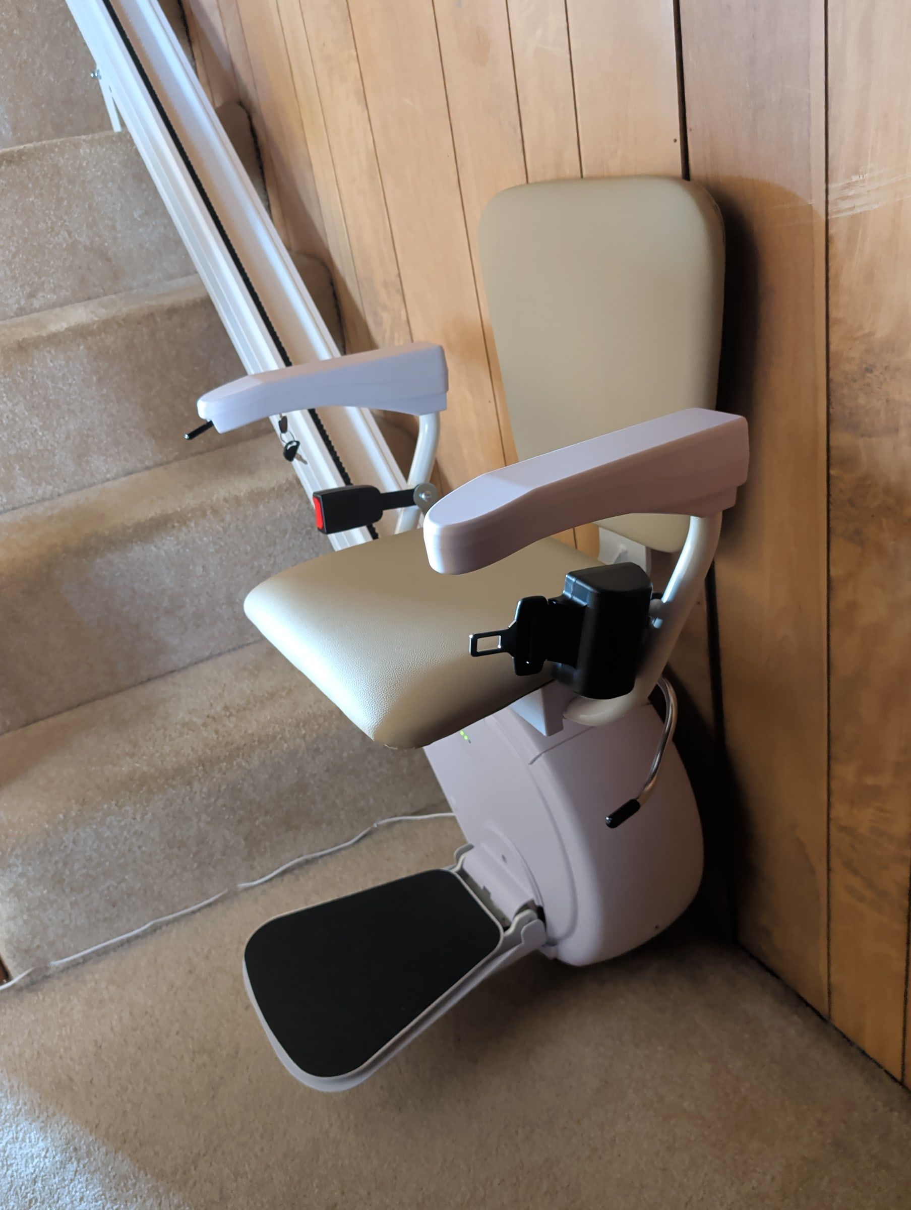 Technician-serviced stairlift seat and rail on a staircase in Chambersburg, PA