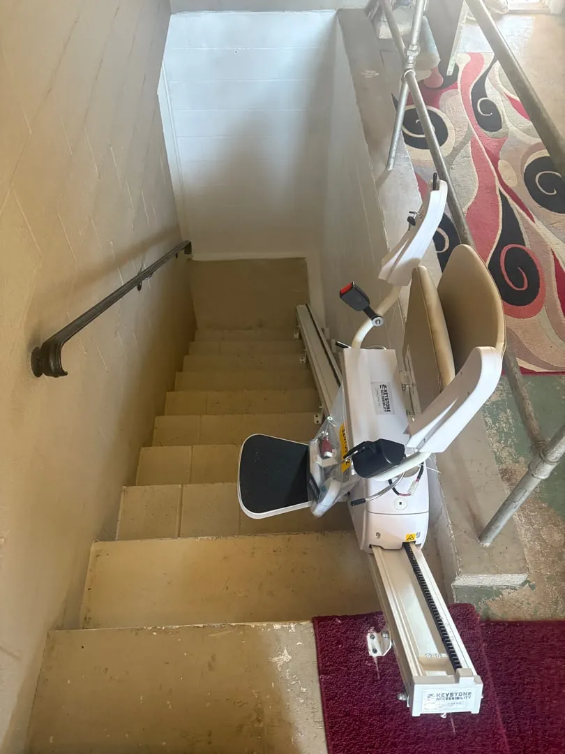 Rental stairlift installed on a straight staircase in Taneytown, MD
