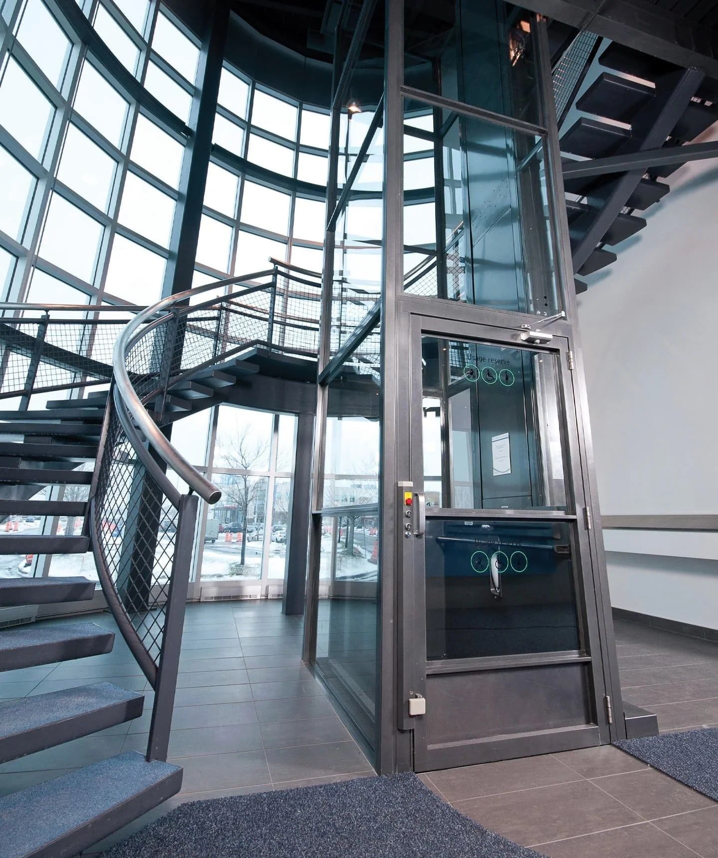 Enclosed Savaria V-1504 vertical platform lift outdoors