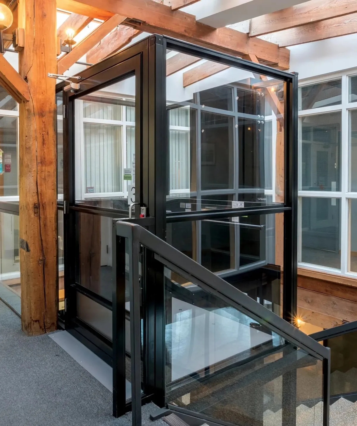 Vertical platform lift installed at a home entrance