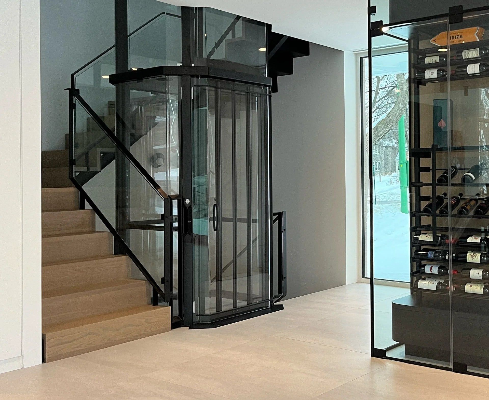 Savaria Vuelift glass elevator in an open-plan house