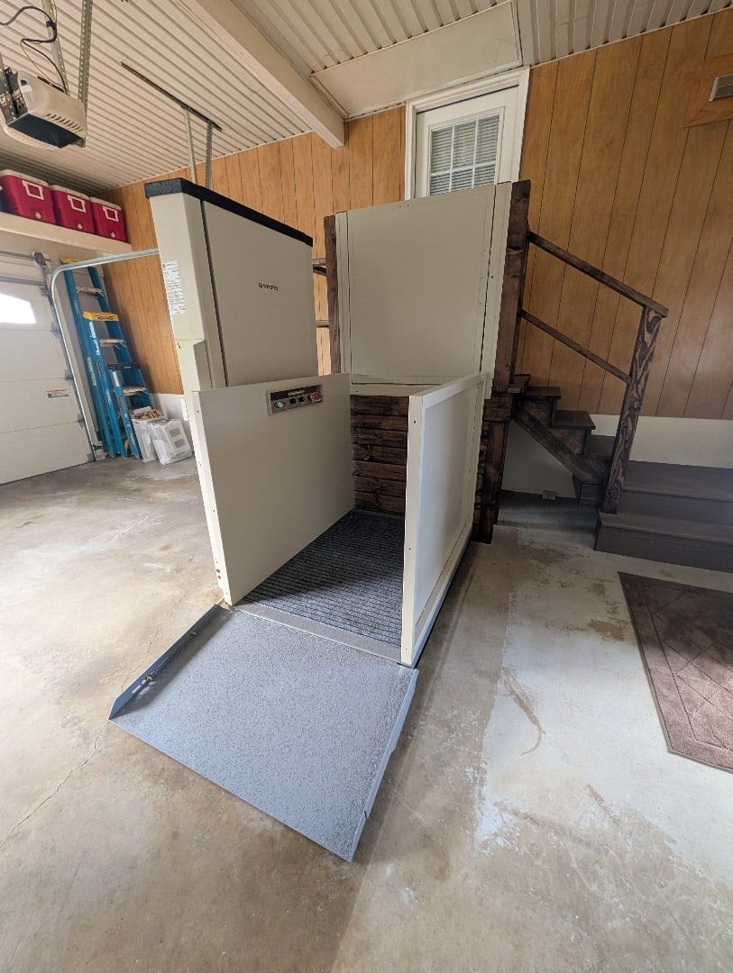 Savaria Multilift vertical platform lift installed at a garage in Ashland, PA